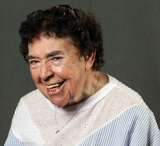 Wilma J. Cavill on gray background